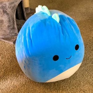 I have a blue and mint color dino Squishmallow in excellent condition.